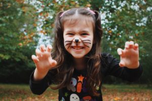 Child dressed as a cat for Halloween 
