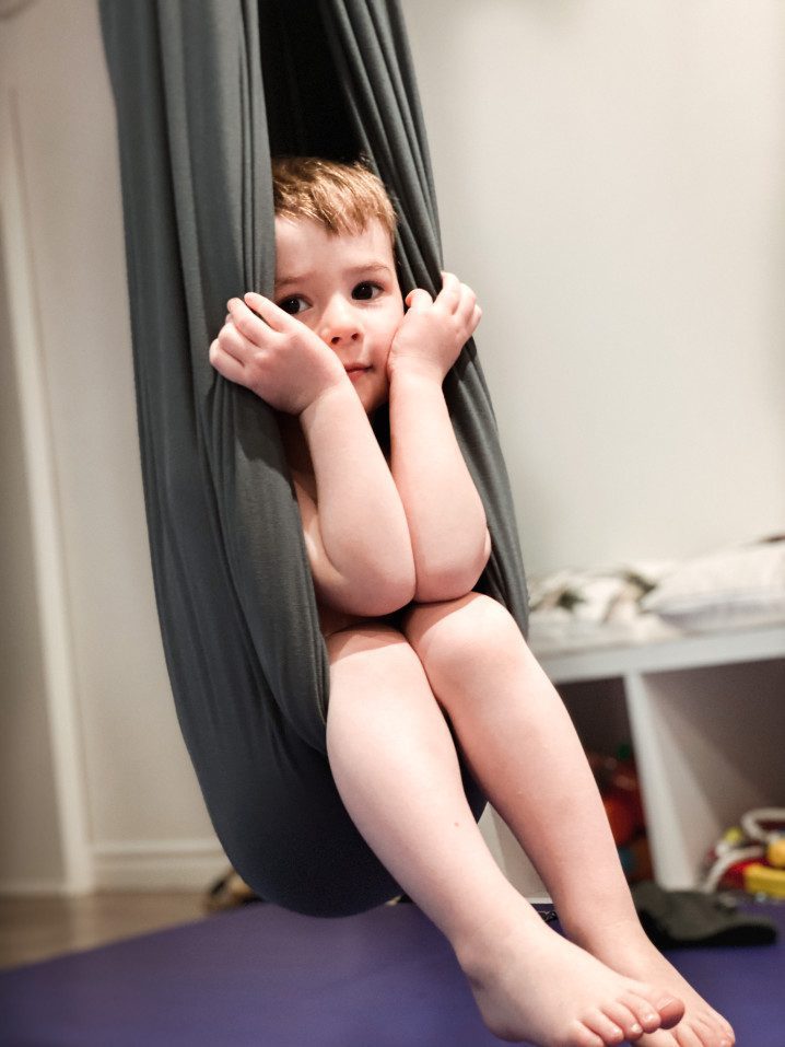 A boy participates in sensory dysfunction therapy integration.